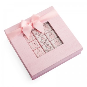 Caja de papel caramelo rosa con cinta